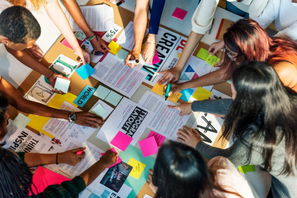 Student in a group working on a project 